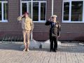 Традиционно с гимна России и поднятия флага началась сегодня работа участковой избирательной комиссии 721